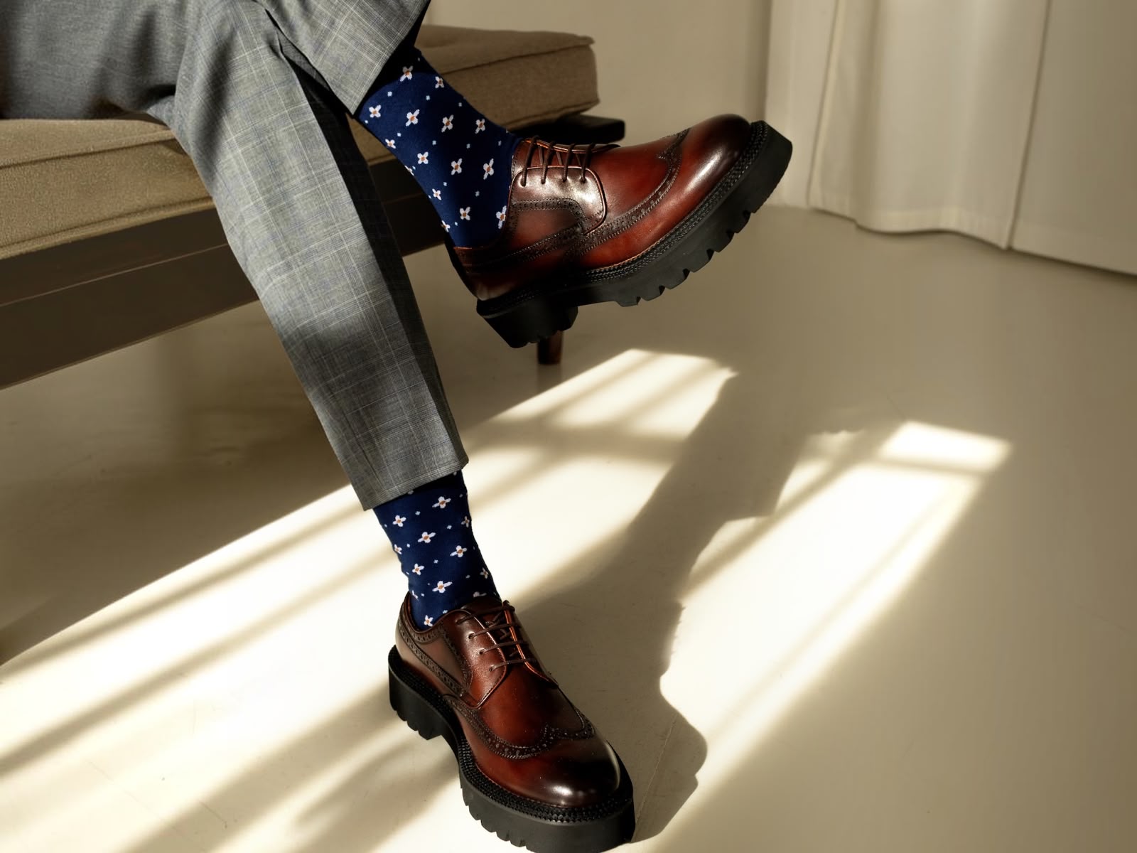 Detail of a hand-finished cognac leather sole